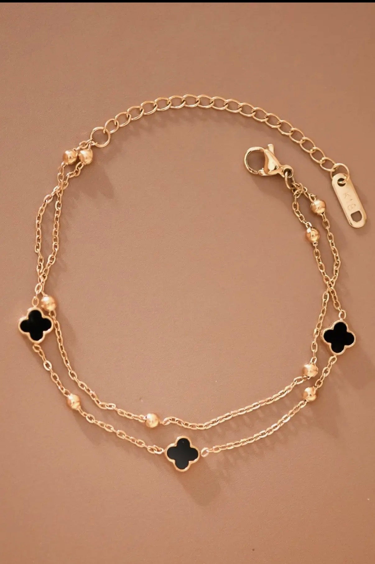 18K GOLD PLATED BLACK CHARM BRACELET