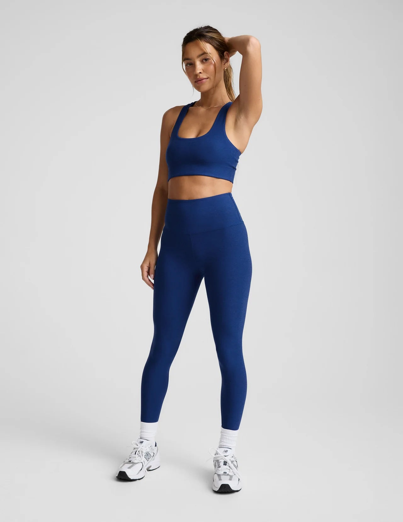 Woman wearing a blue athletic outfit