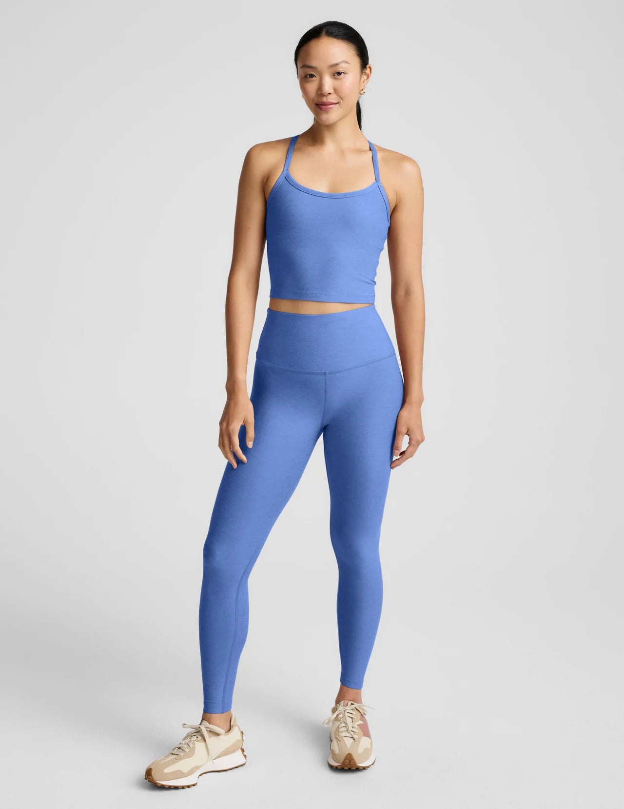 Woman wearing a blue athletic outfit 
