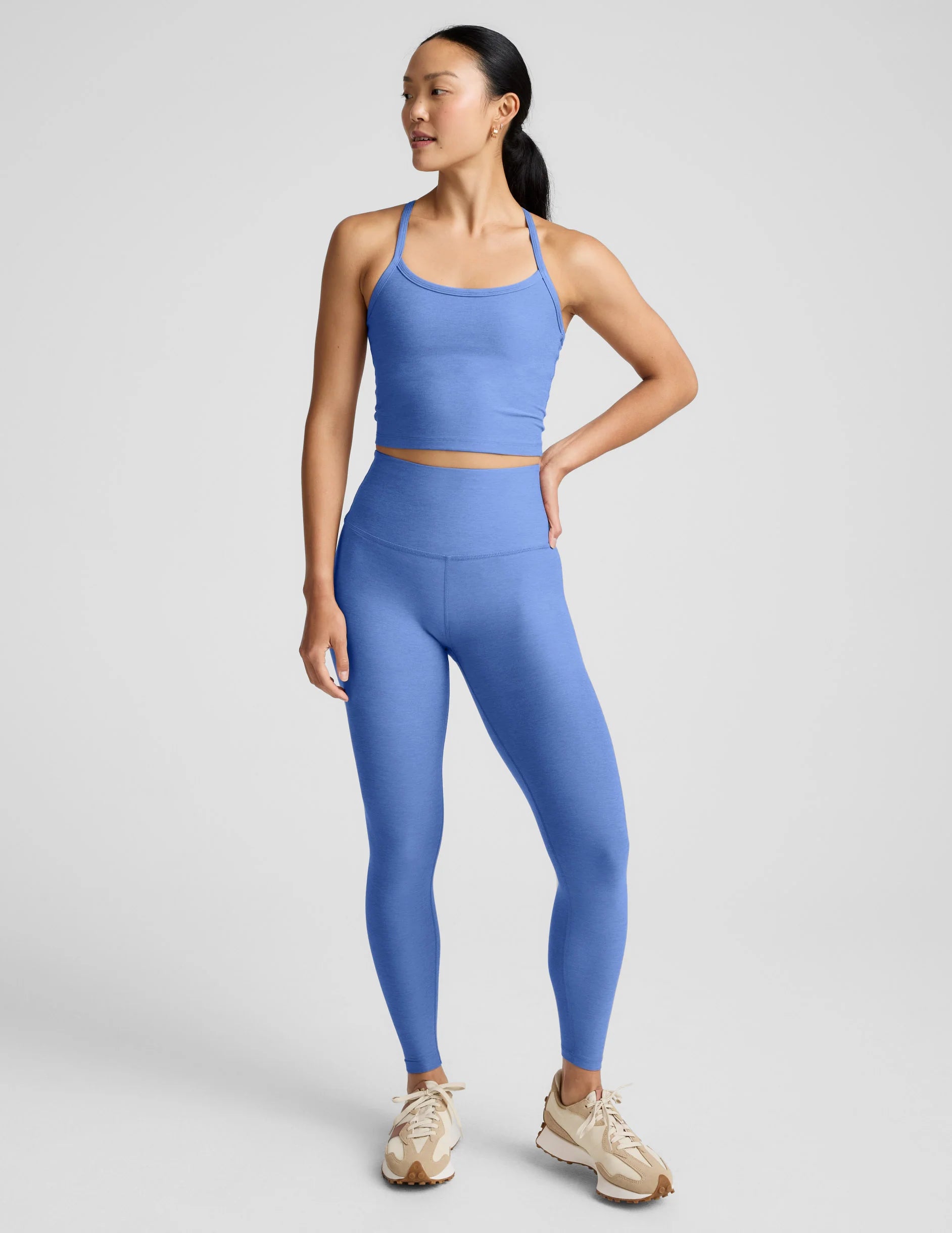 Woman wearing a blue athletic outfit
