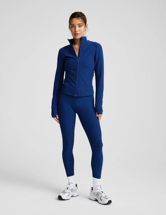 Woman wearing a blue athletic outfit 