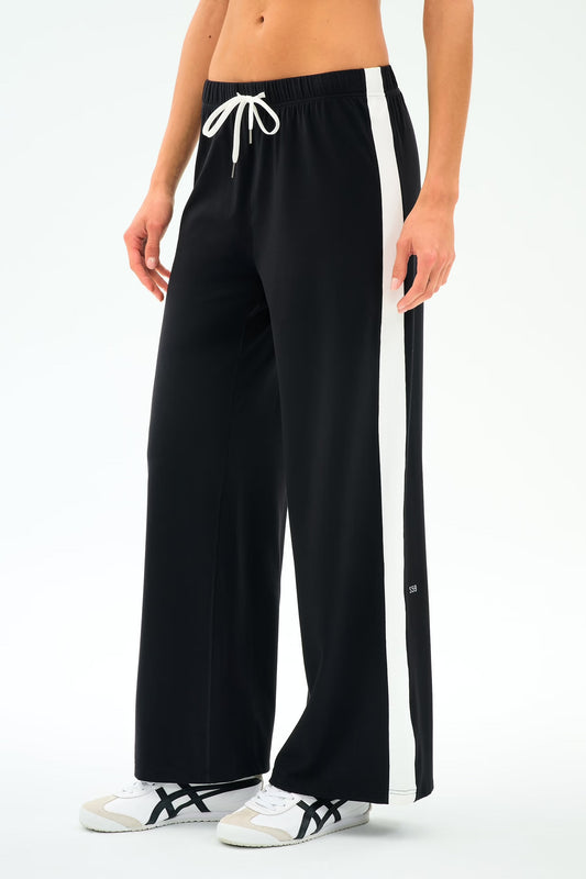 Black wide-leg pants with a white drawstring and side stripe 